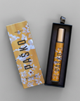 Pasko Mahogany perfume bottle and packaging on a gray background